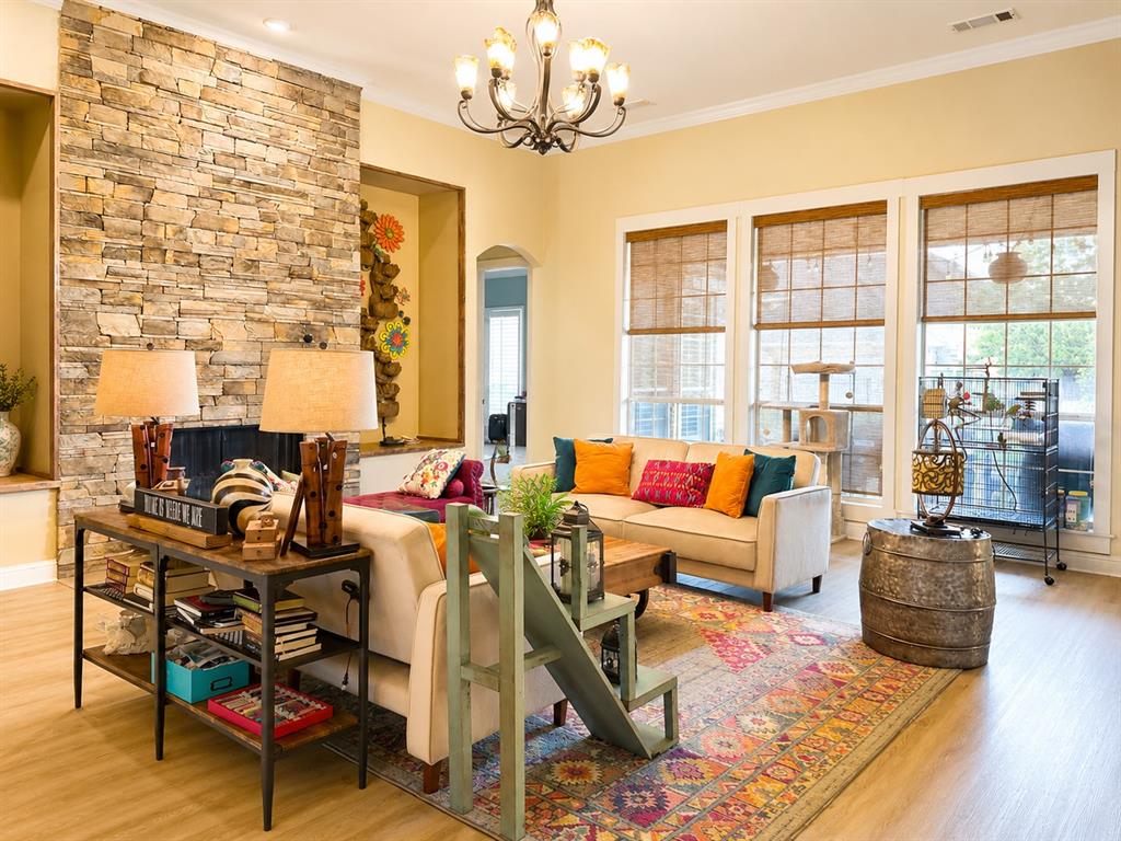 6004 Ridgemore Drive Parker, TX 75002 - Photo 4 of 13 a living room with furniture a rug and a floor to ceiling window