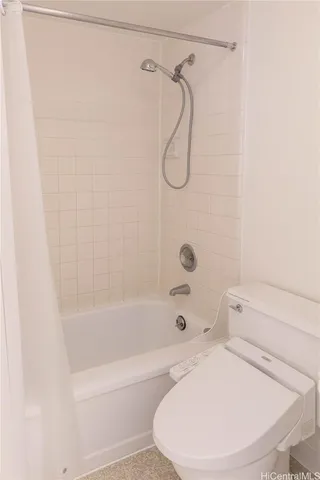 a bathroom with a sink a toilet and a bathtub