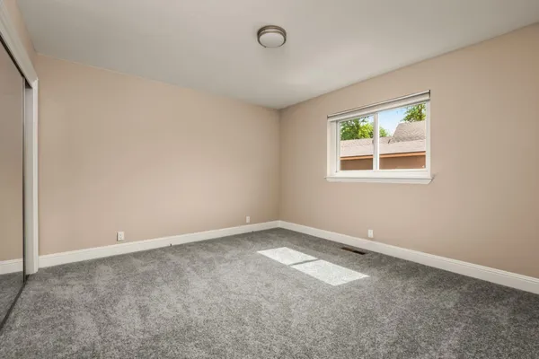 a view of a room with rack on the wall