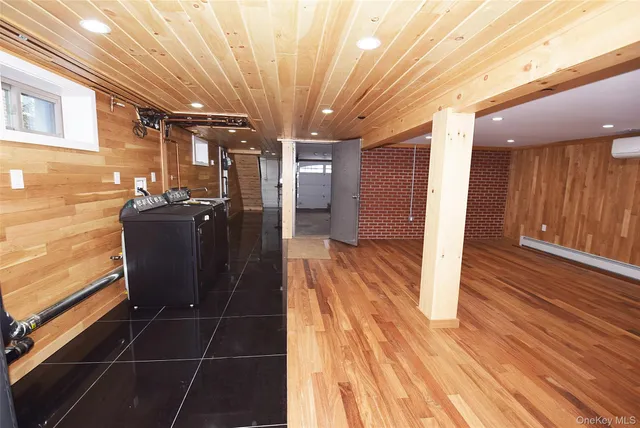 a view of a house with wooden deck