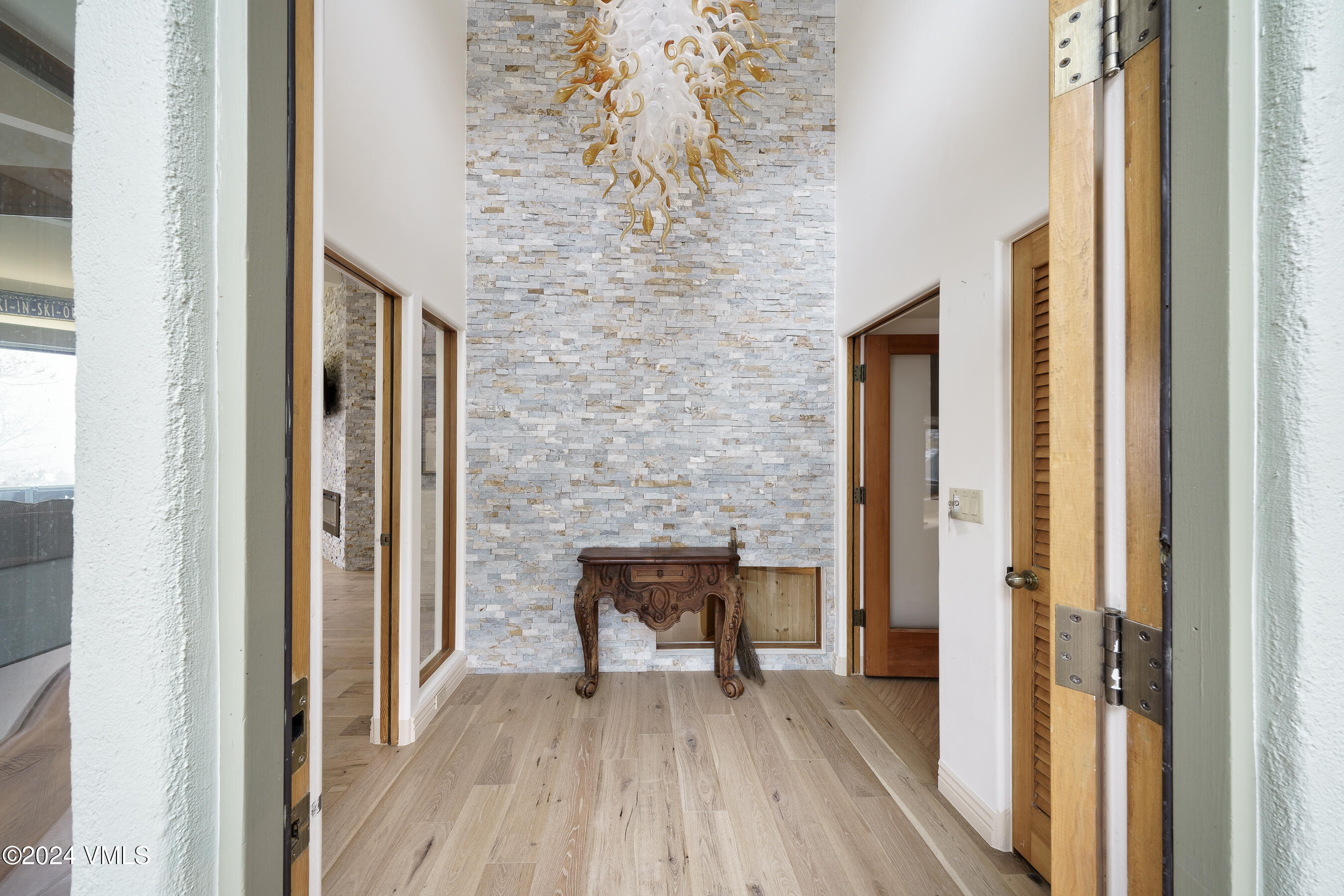 4747 Wildridge Road Avon, CO 81620 - Photo 4 of 51 a view of front door with wooden floor