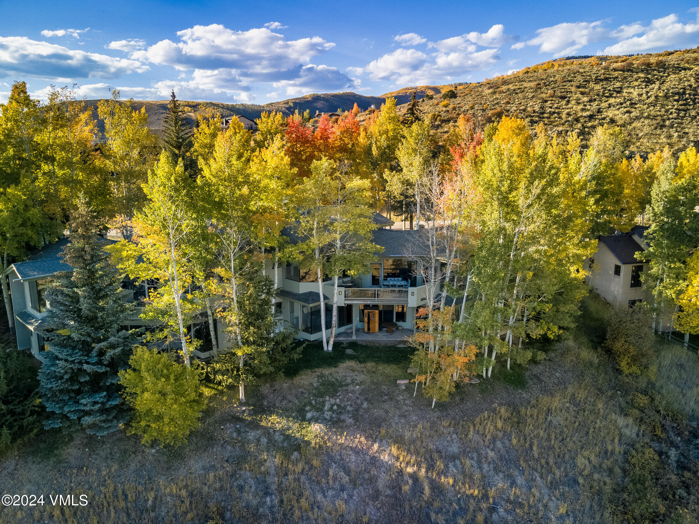 4747 Wildridge Road Avon, CO 81620 - Photo 41 of 51 a view of a house with a yard