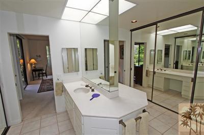 815 Inverness Drive Rancho Mirage, CA 92270 - Photo 15 of 25 a en suite bathroom with a tub shower and sink