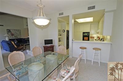 815 Inverness Drive Rancho Mirage, CA 92270 - Photo 10 of 25 a living room with furniture a table and chairs