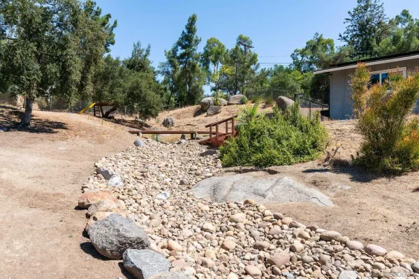 a view of balcony with wooden floor and outdoor space