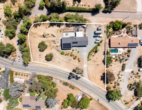 a view of swimming pool with a table and chairs