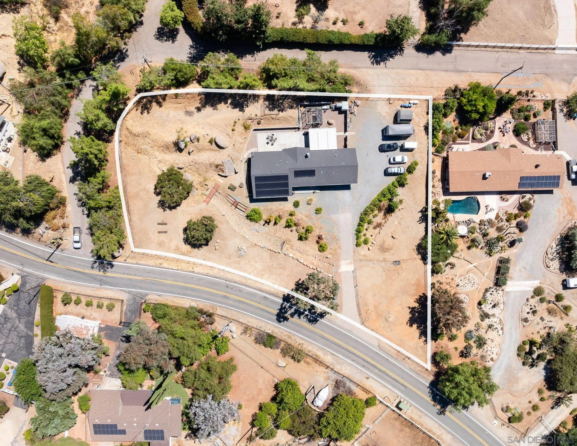 2855 North Victoria Drive Alpine, CA 91901 - Photo 37 of 42 an aerial view of a house with a swimming pool