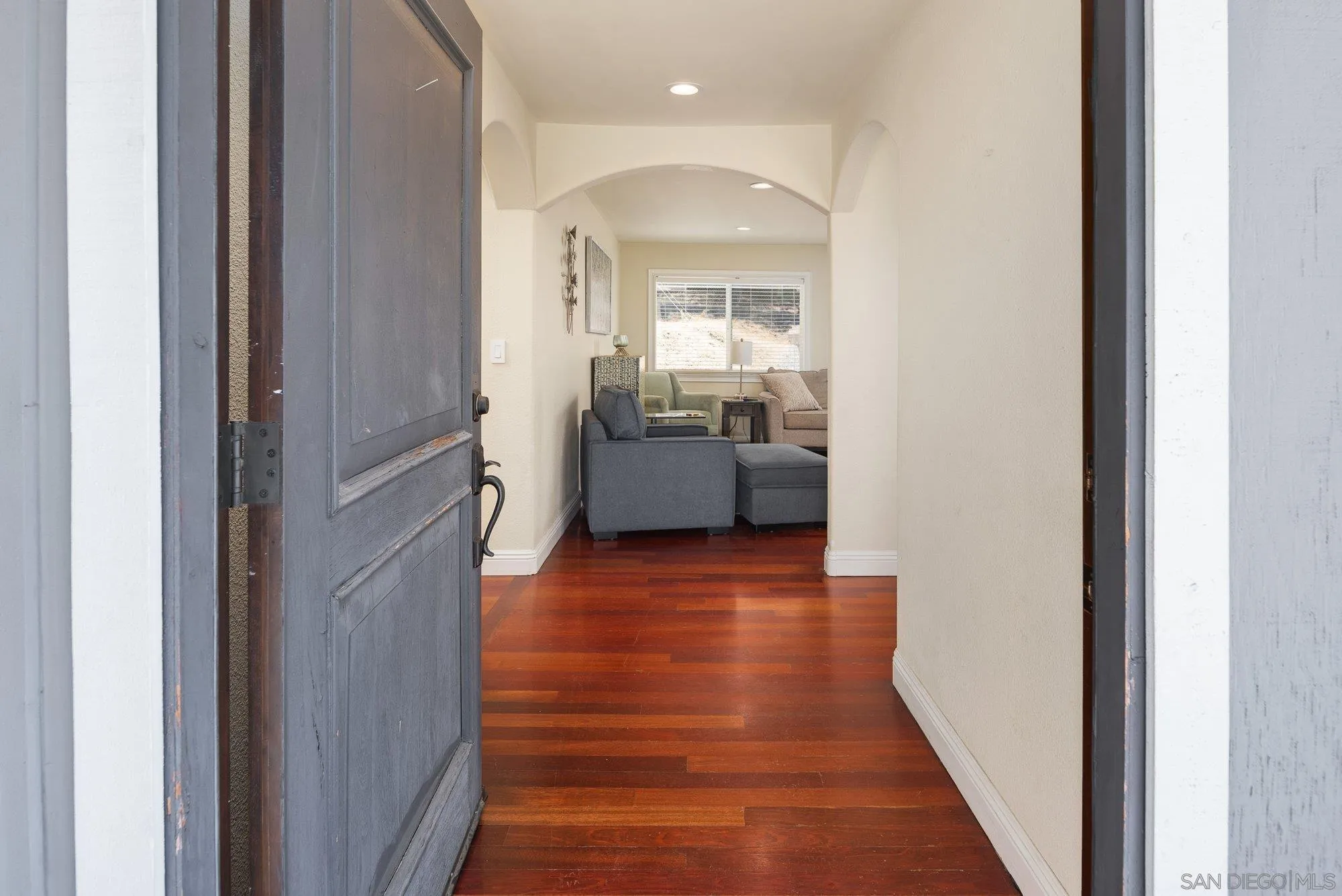 2855 North Victoria Drive Alpine, CA 91901 - Photo 7 of 42 a view of a hallway with furniture and wooden floor