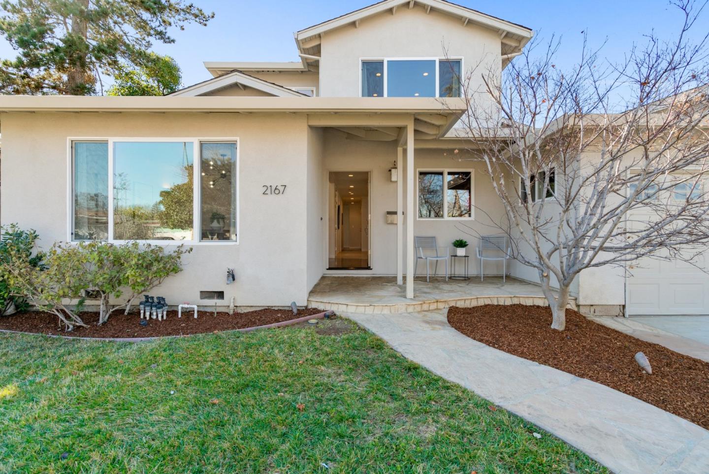 2167 Violet Way Campbell, CA 95008 - Photo 2 of 42 a front view of a house with a yard