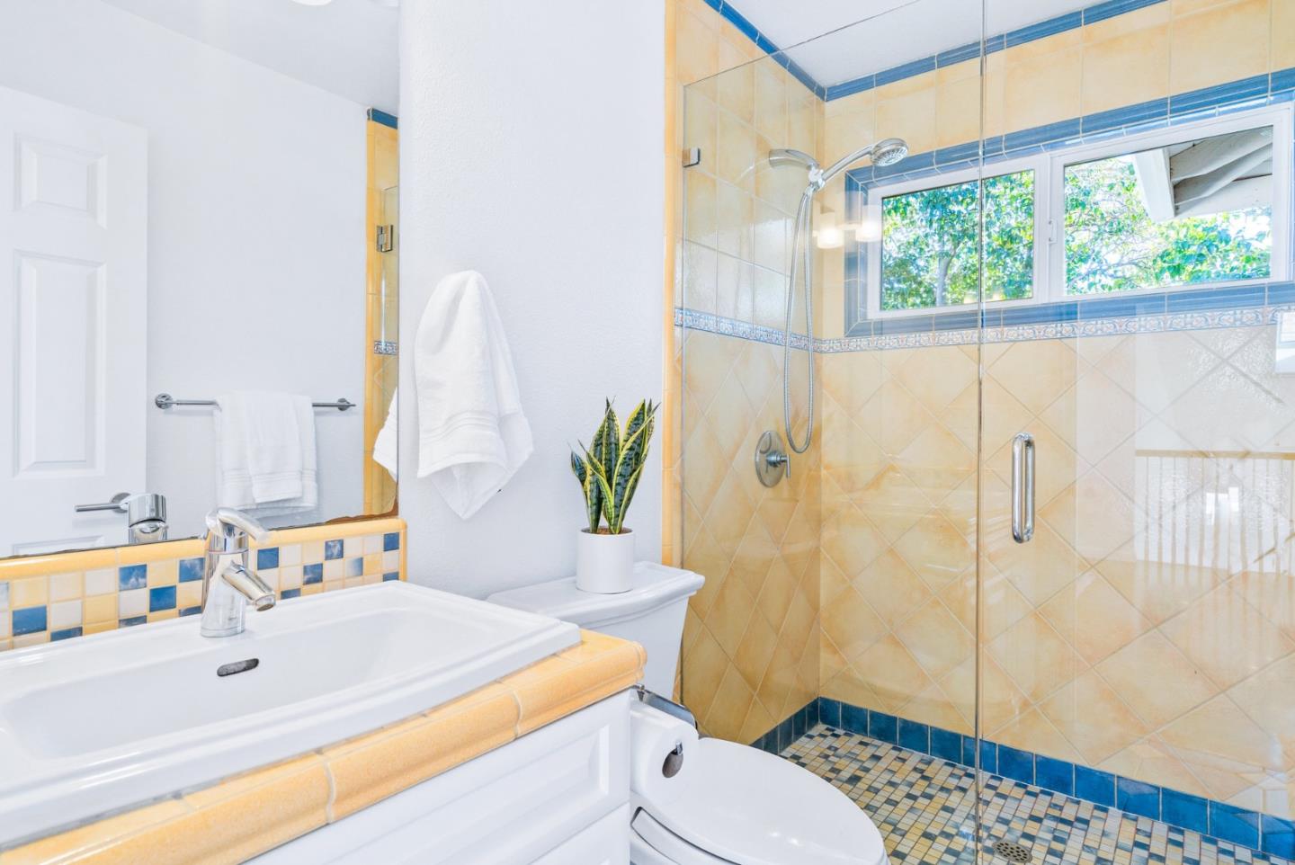 2167 Violet Way Campbell, CA 95008 - Photo 28 of 42 a bathroom with a sink a toilet and shower