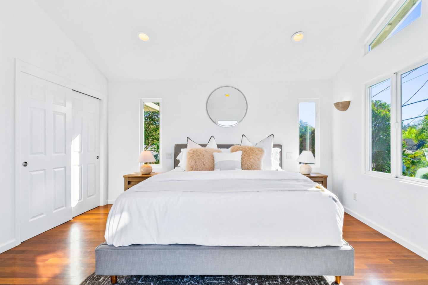 2167 Violet Way Campbell, CA 95008 - Photo 31 of 42 a large bed sitting in a bedroom next to a window