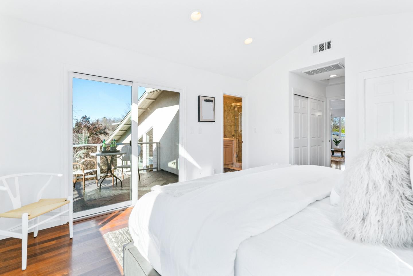 2167 Violet Way Campbell, CA 95008 - Photo 32 of 42 a spacious bedroom with a bed and a mirror