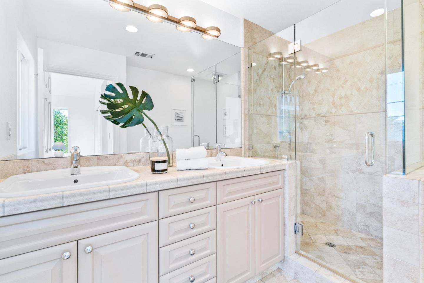 2167 Violet Way Campbell, CA 95008 - Photo 33 of 42 a bathroom with a double vanity sink mirror and shower