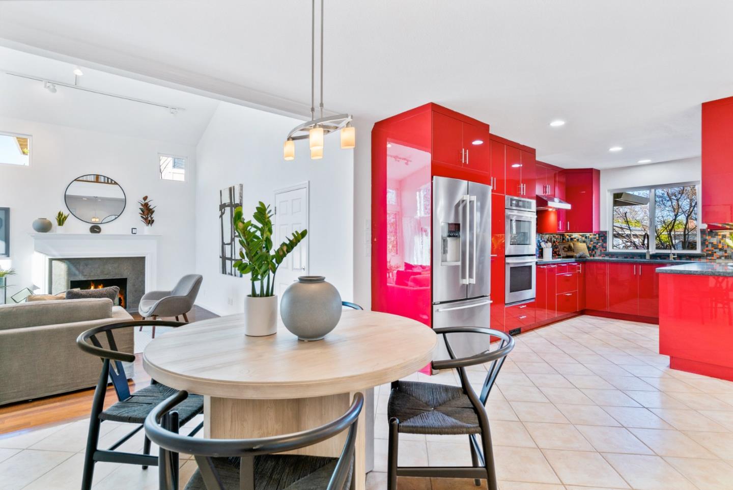2167 Violet Way Campbell, CA 95008 - Photo 9 of 42 a kitchen with a table chairs and a kitchen