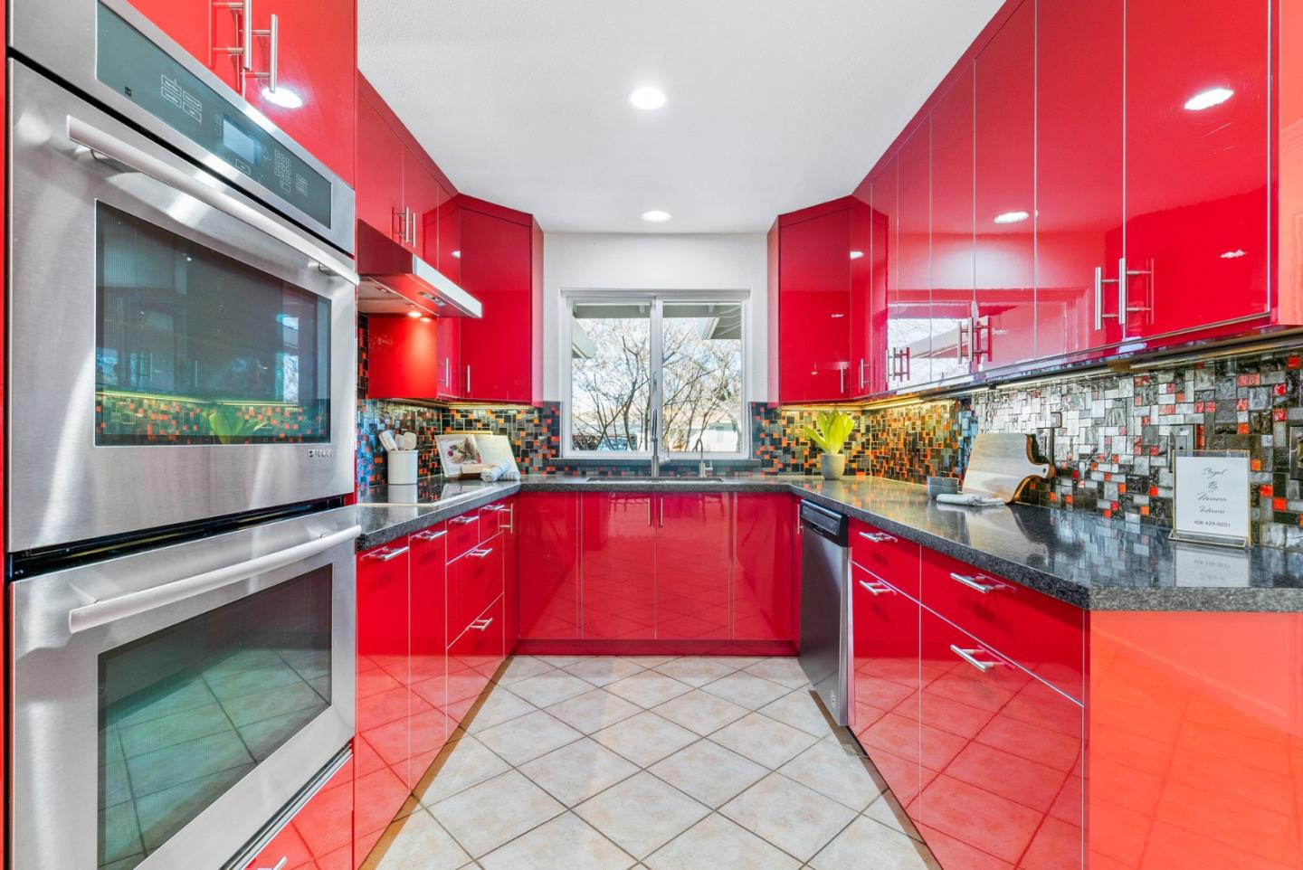 2167 Violet Way Campbell, CA 95008 - Photo 10 of 42 a kitchen with stainless steel appliances granite countertop a red stove top oven a sink and dishwasher