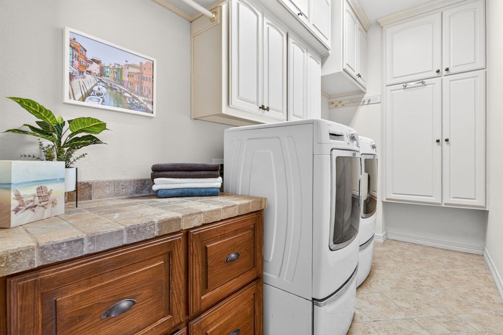 128 Canyon Ridge Trail Aledo, TX 76008 - Photo 19 of 40 Okay can we all take a moment to appreciate this AMAZING laundry room? So much storage.