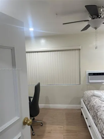 a kitchen with stainless steel appliances a refrigerator and cabinets