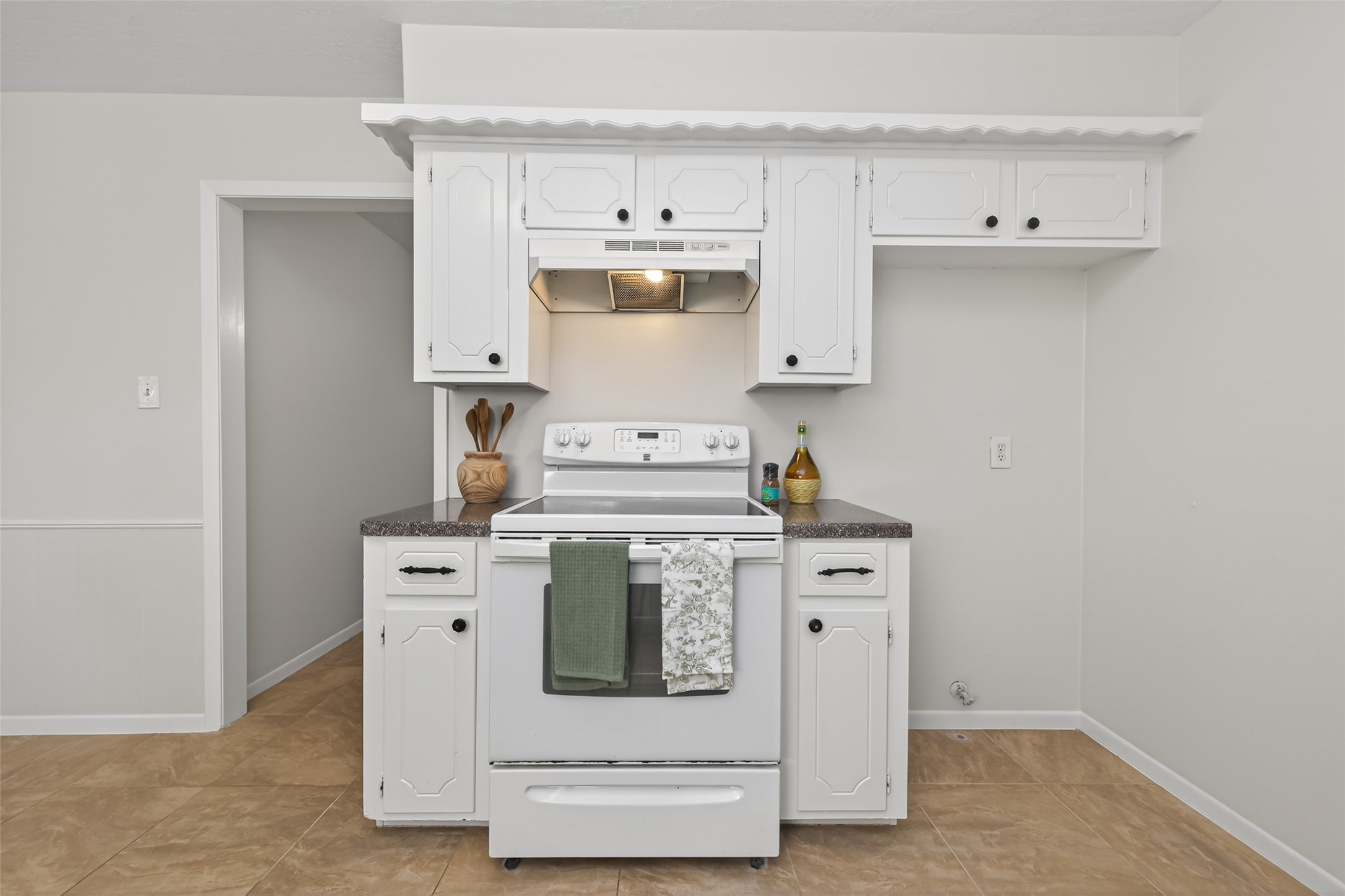 23919 Farm Hill Drive Spring, TX 77373 - Photo 19 of 41 a white stove top oven sitting inside of a kitchen