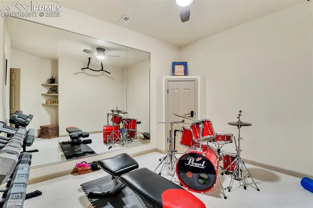 a view of gym equipment and children play room