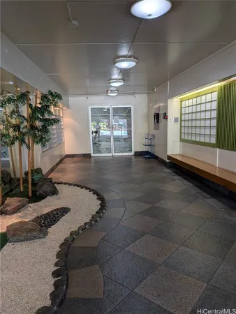 a view of entryway with livingroom