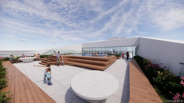 a terrace with outdoor seating and city view