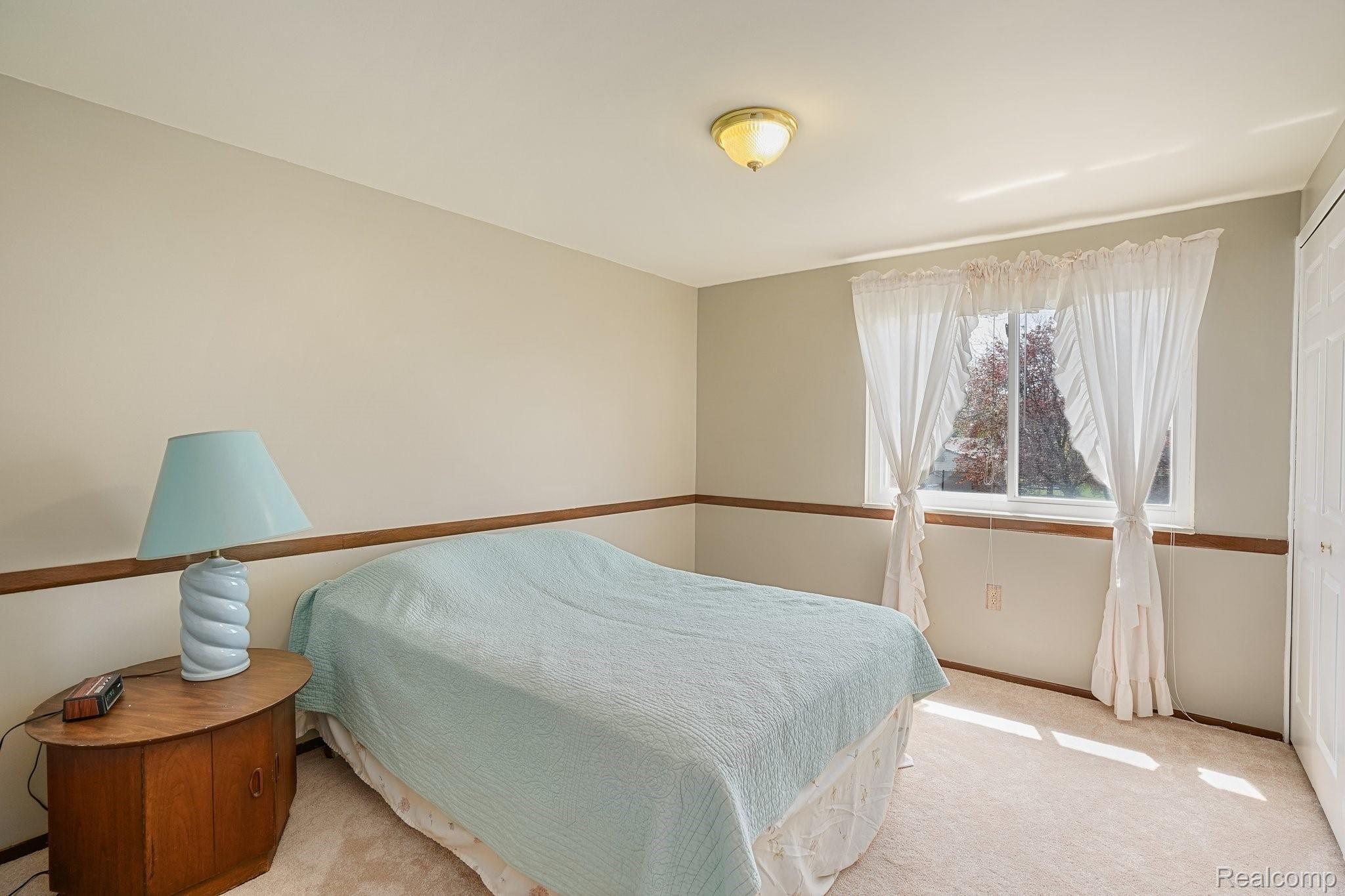 691 Abbey Court Rochester, MI 48307 - Photo 28 of 39 Second Bedroom - New Paint & Carpet (2021)