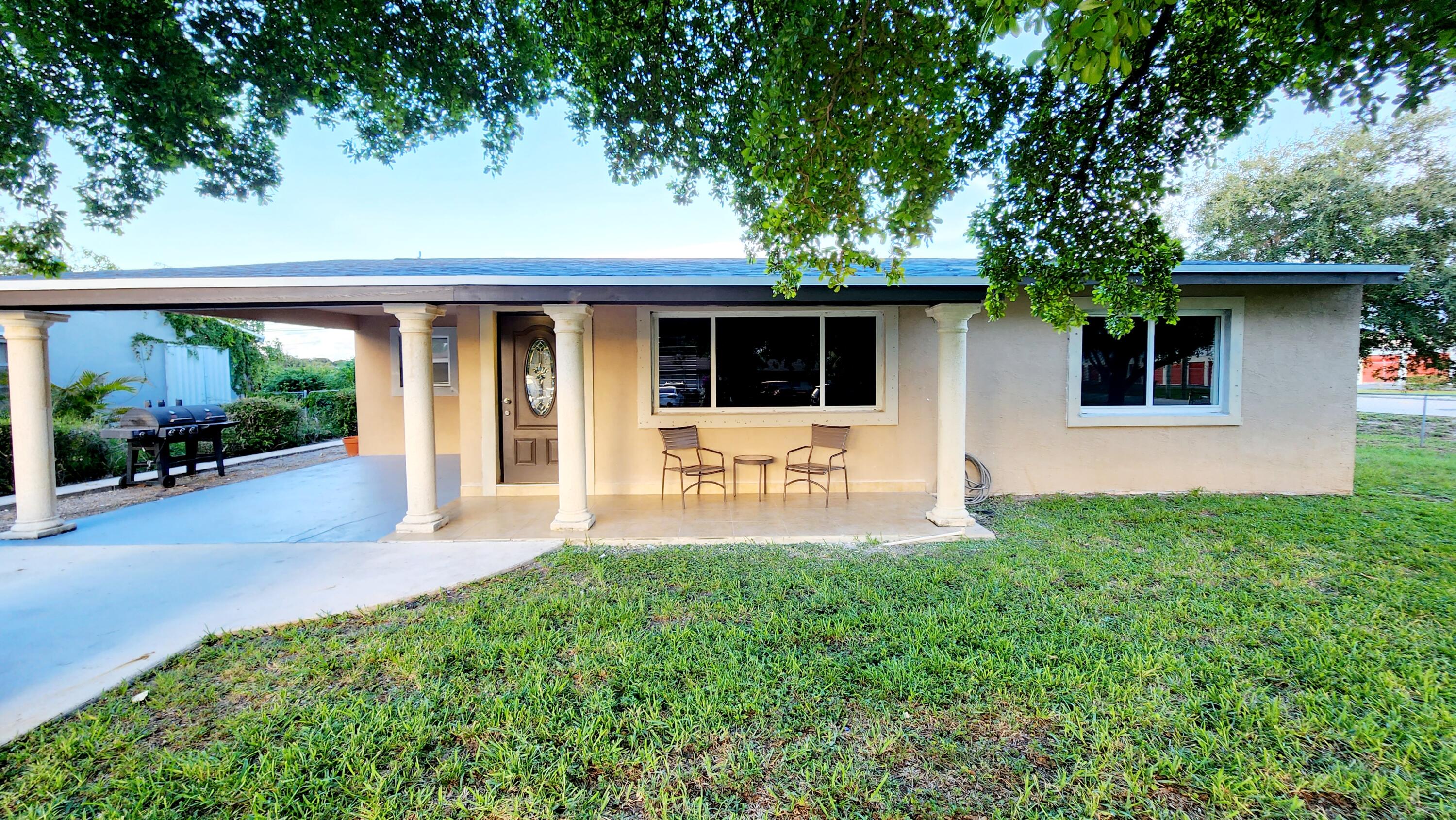 102 Engle Road Lake Worth, FL 33461 - Photo 1 of 16 Exterior front