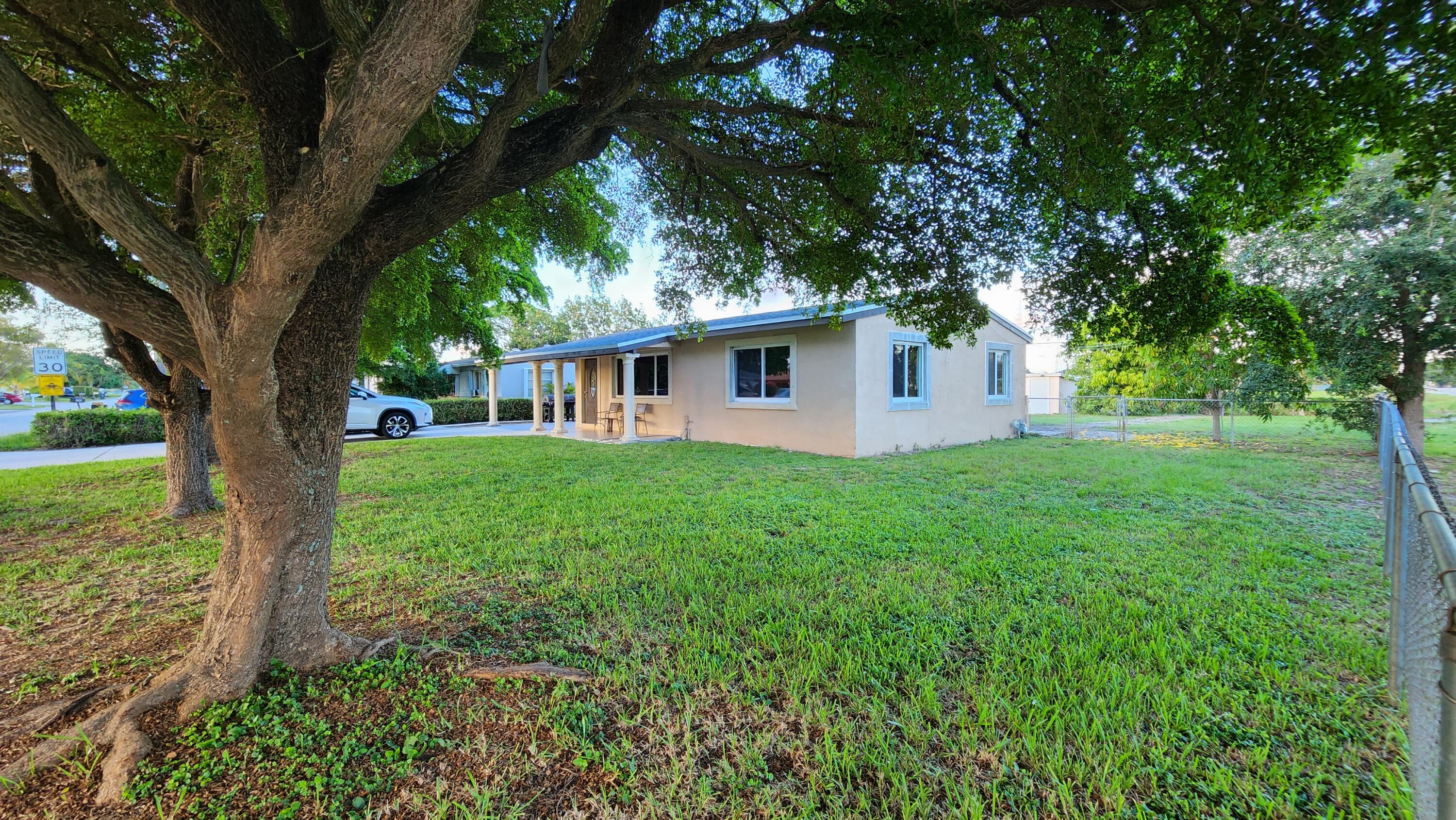 102 Engle Road Lake Worth, FL 33461 - Photo 11 of 16 Exterior front