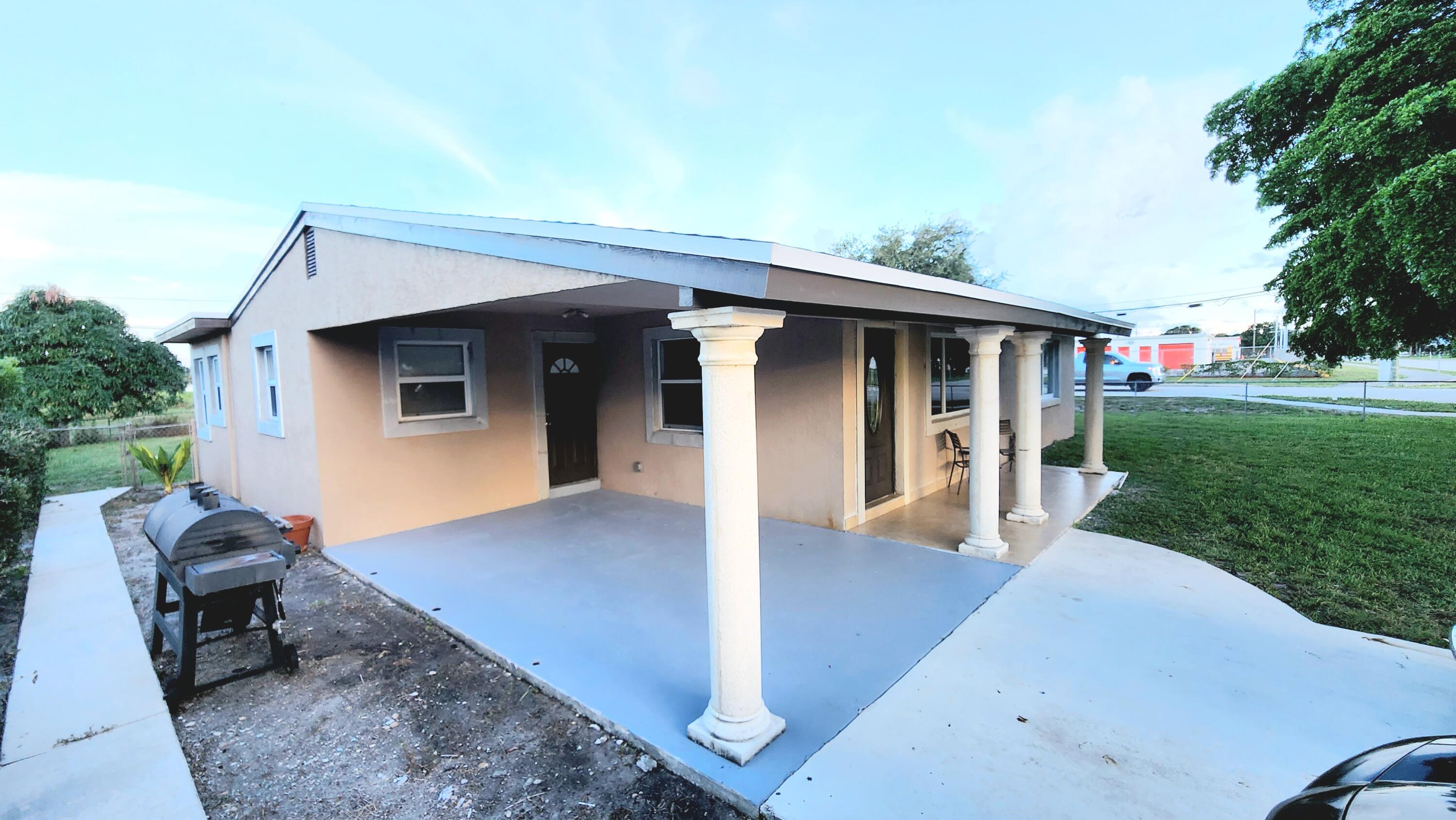102 Engle Road Lake Worth, FL 33461 - Photo 13 of 16 Exterior front