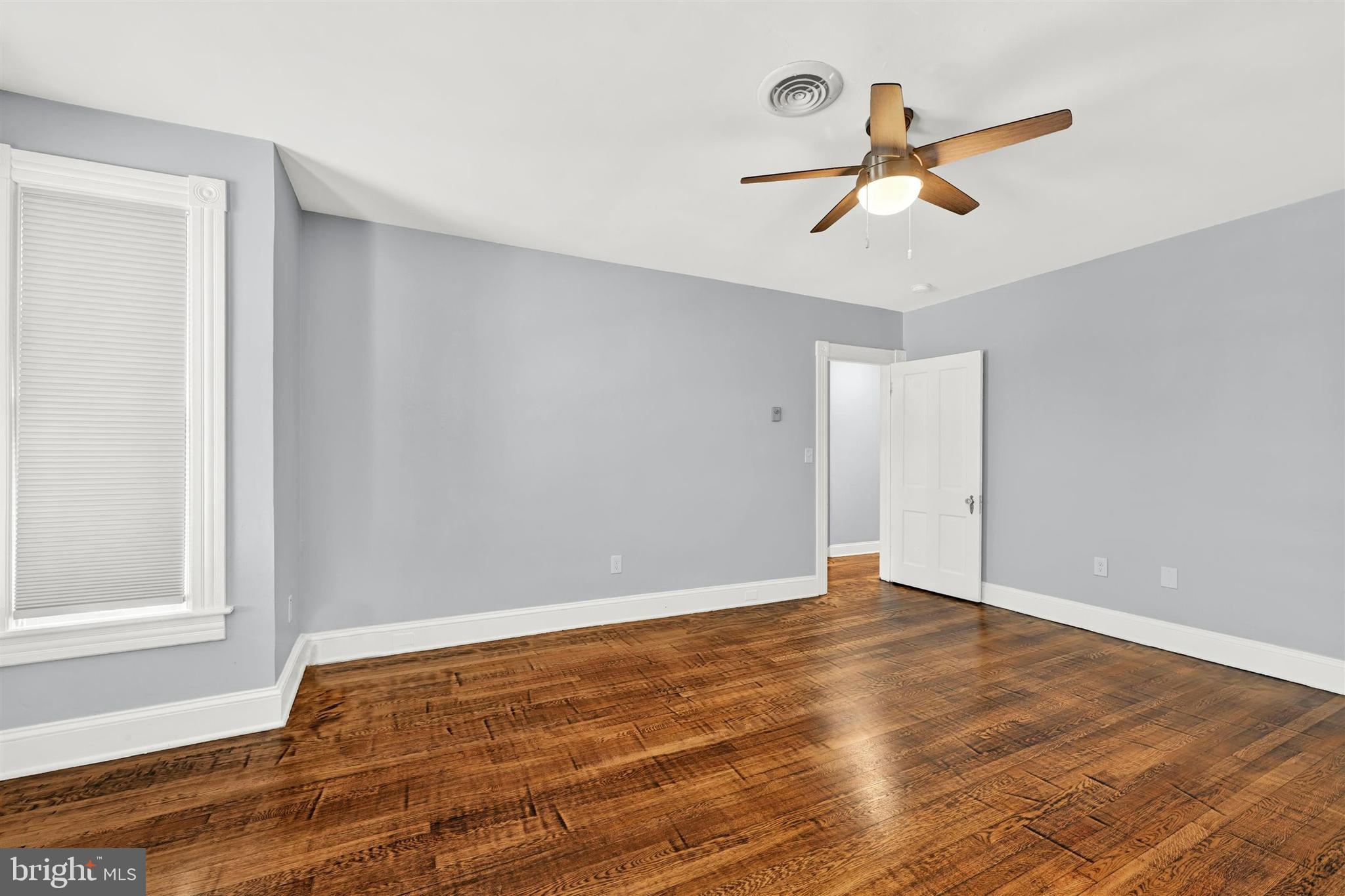 125 West Main Street Westminster, MD 21157 - Photo 26 of 31 wooden floor in an empty room