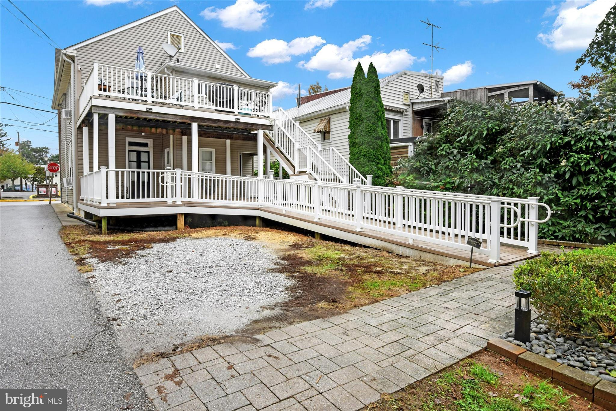 125 West Main Street Westminster, MD 21157 - Photo 6 of 31 a view of a house with backyard porch and sitting area