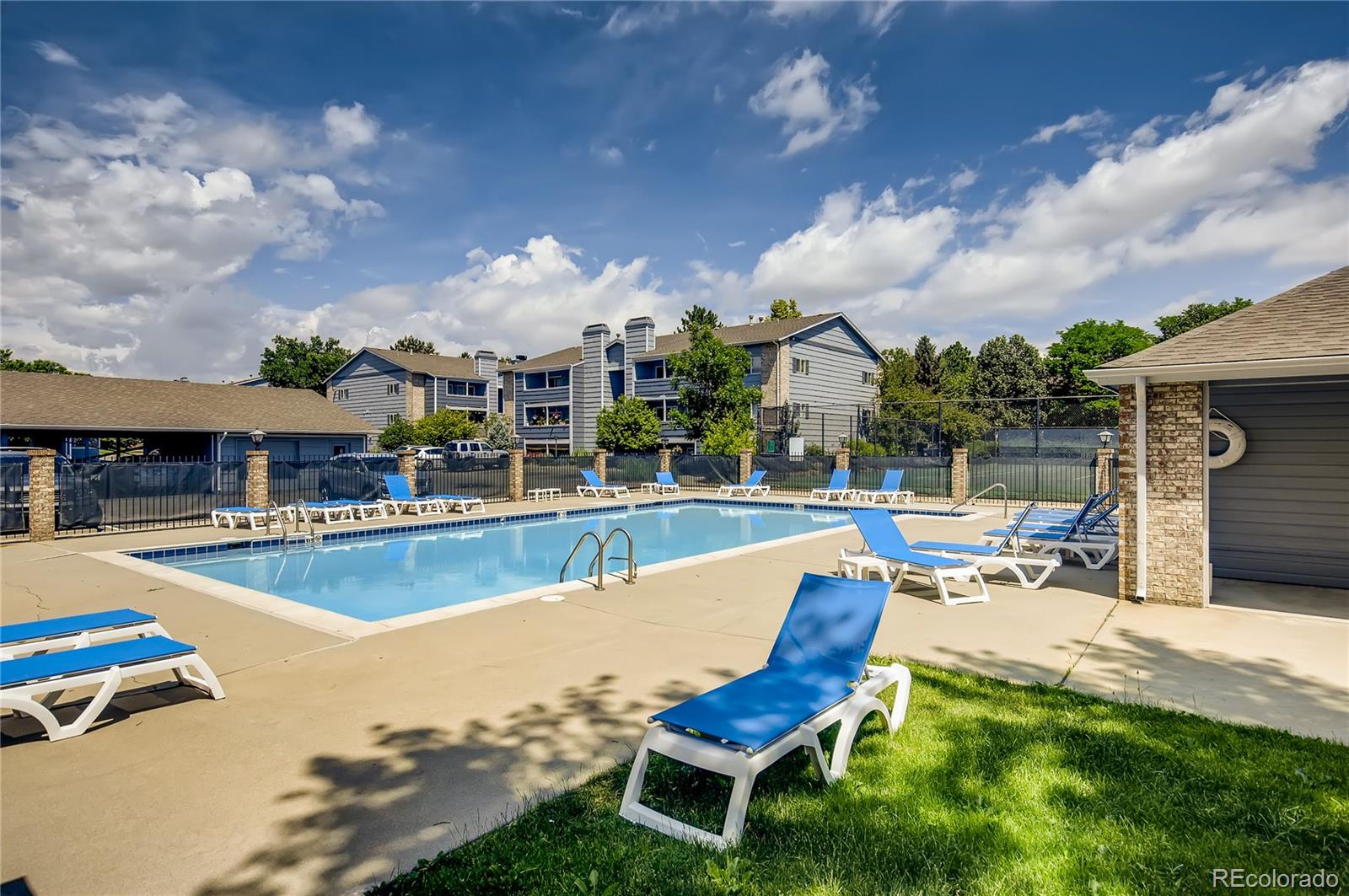 4682 White Rock Circle, Unit 9 Boulder, CO 80301 - Photo 12 of 12 a view of a swimming pool and lounge chair