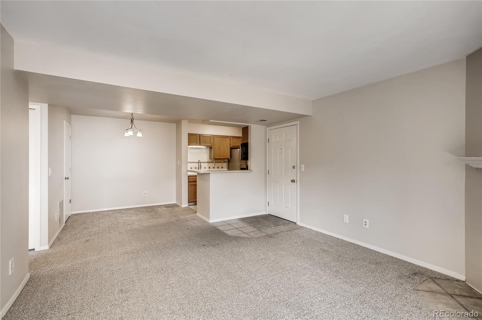 4682 White Rock Circle, Unit 9 Boulder, CO 80301 - Photo 3 of 12 a view of a big room with closet and windows