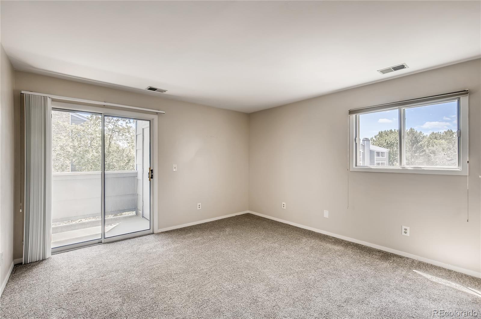 4682 White Rock Circle, Unit 9 Boulder, CO 80301 - Photo 6 of 12 an empty room with a window
