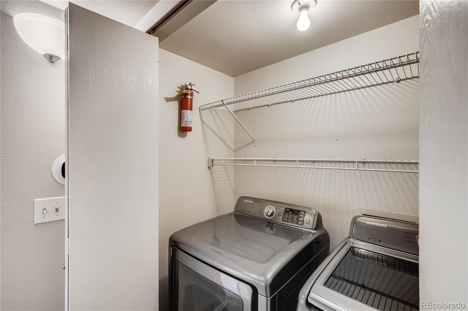 4682 White Rock Circle, Unit 9 Boulder, CO 80301 - Photo 8 of 12 a utility room with dryer and washer