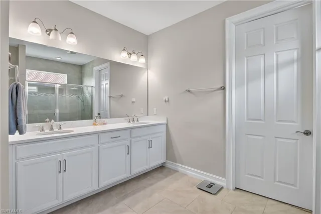 $999,000 | 18725 Lake Hammock Drive, Naples, FL 34114