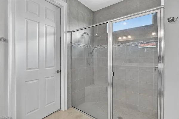 $925,000 | 18725 Lake Hammock Drive, Naples, FL 34114