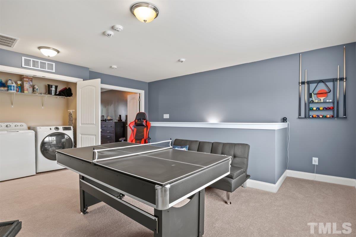 3529 Eastern Branch Road Raleigh, NC 27610 - Photo 18 of 24 a living room with game table