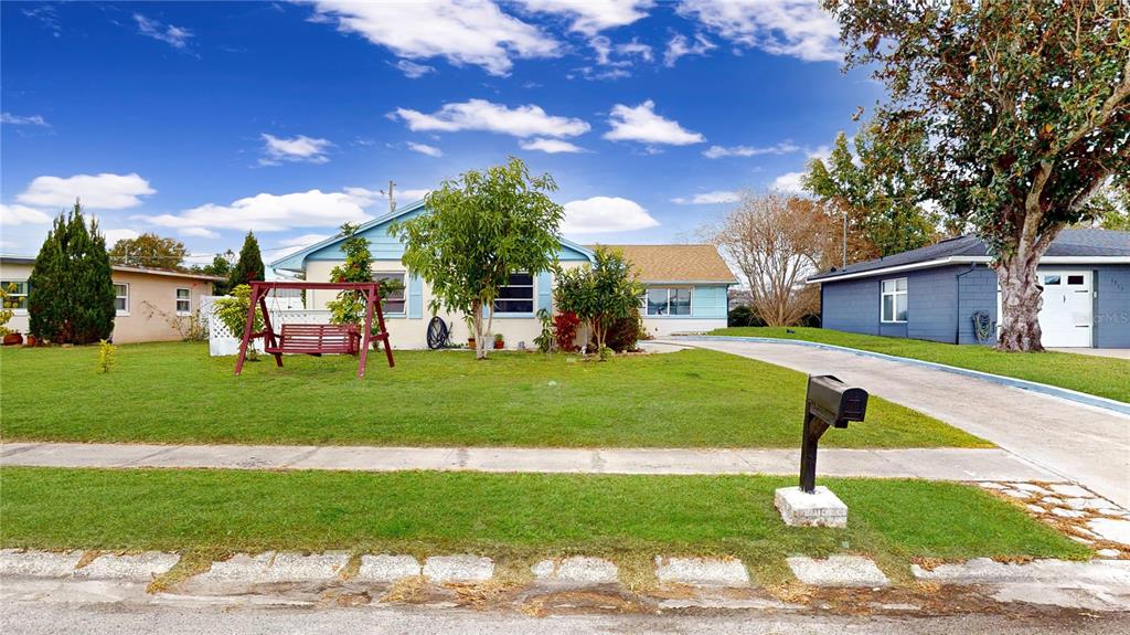 a view of a house with a big yard