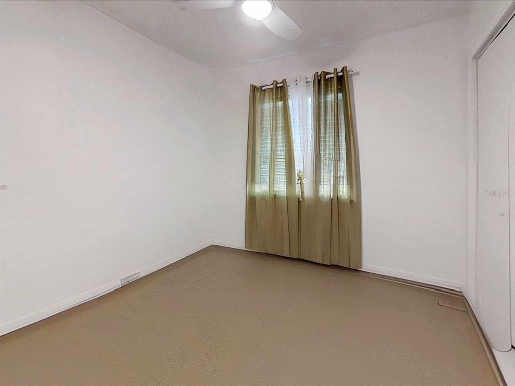 2615 Cecile Street Kissimmee, FL 34741 - Photo 20 of 30 an empty room with stairs