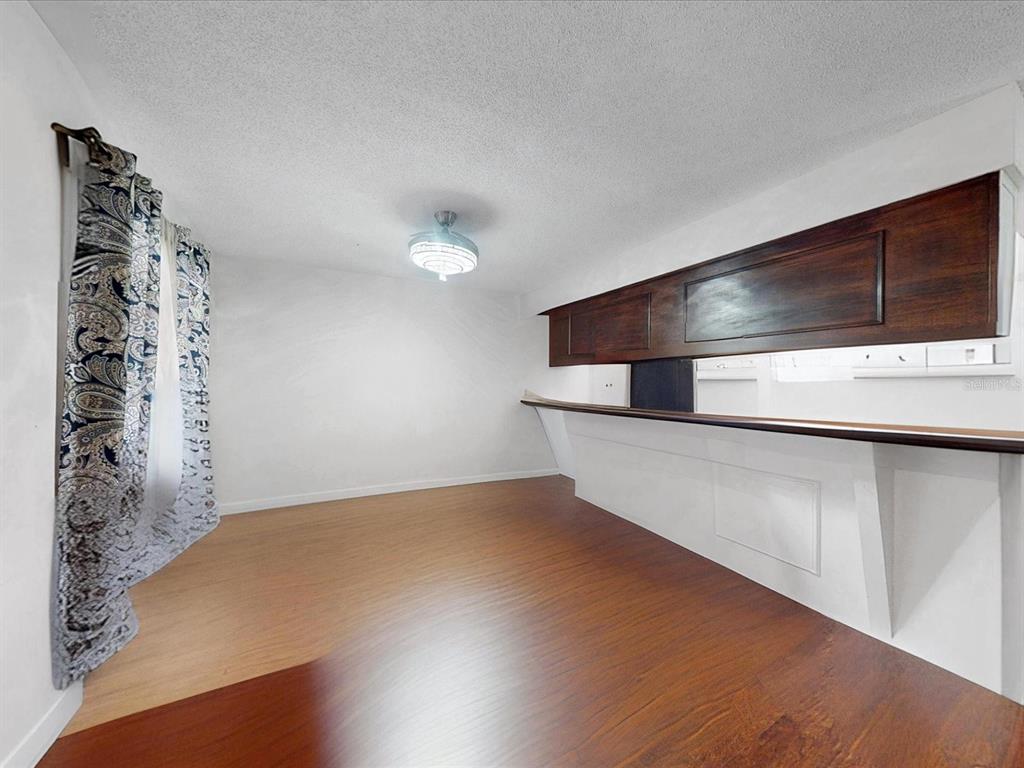 2615 Cecile Street Kissimmee, FL 34741 - Photo 7 of 30 a view of an empty room with a window