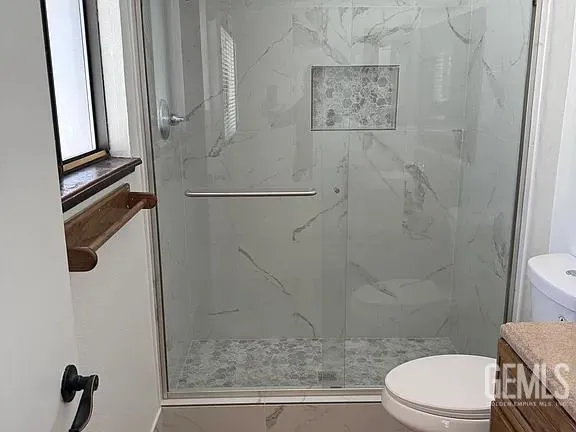 a view of a house with a large window