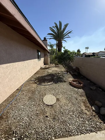 a view of a street with a building in the background