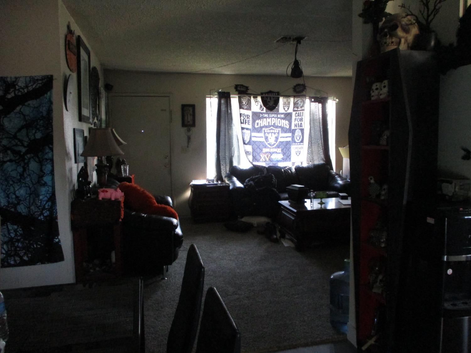 8437 Cherbourg Way Stockton, CA 95210 - Photo 12 of 28 a living room with furniture and a window