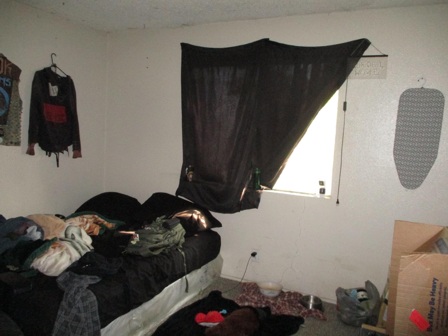 8437 Cherbourg Way Stockton, CA 95210 - Photo 17 of 28 a bedroom with a bed and a window