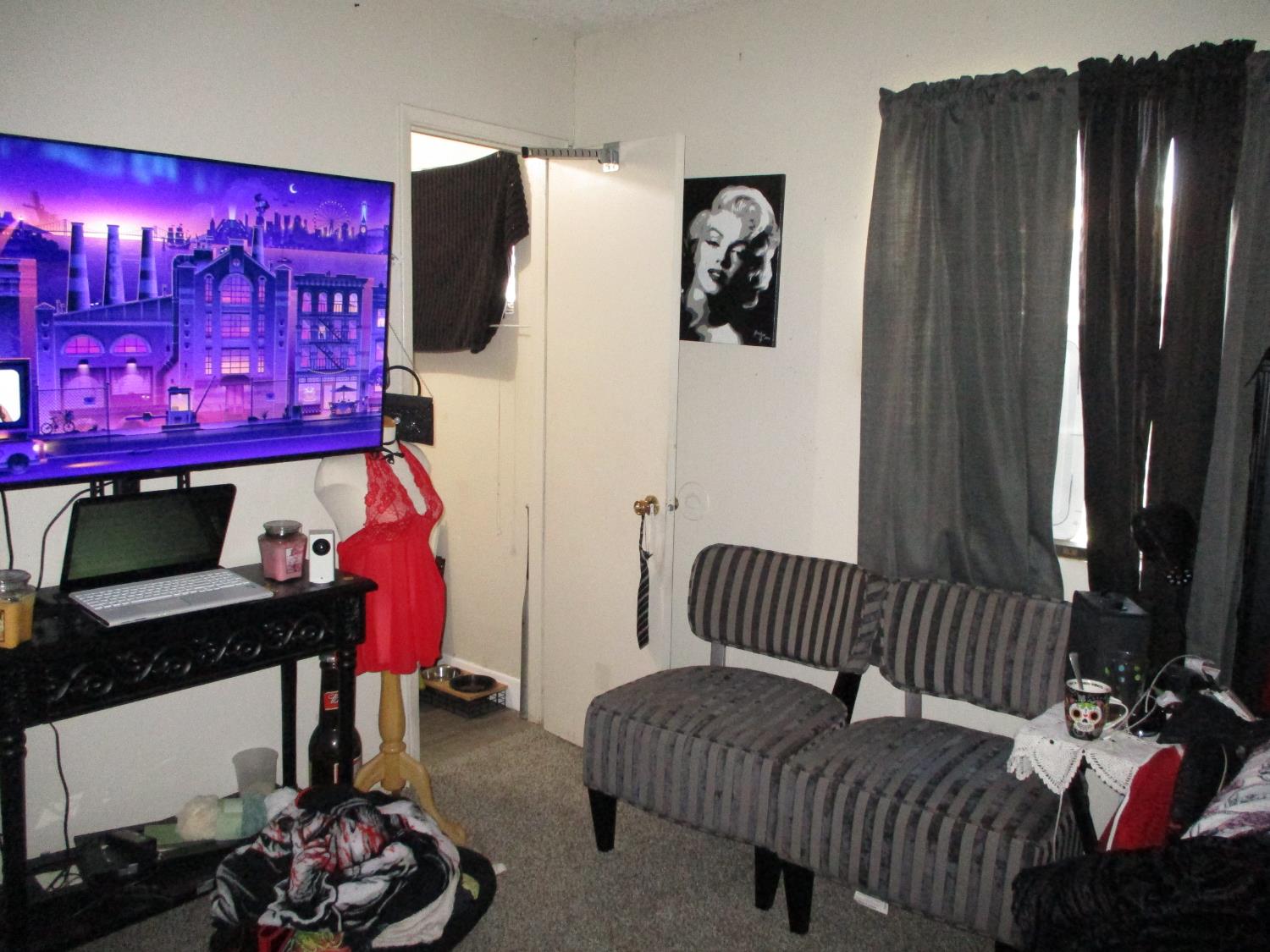 8437 Cherbourg Way Stockton, CA 95210 - Photo 19 of 28 a bedroom with furniture and a window