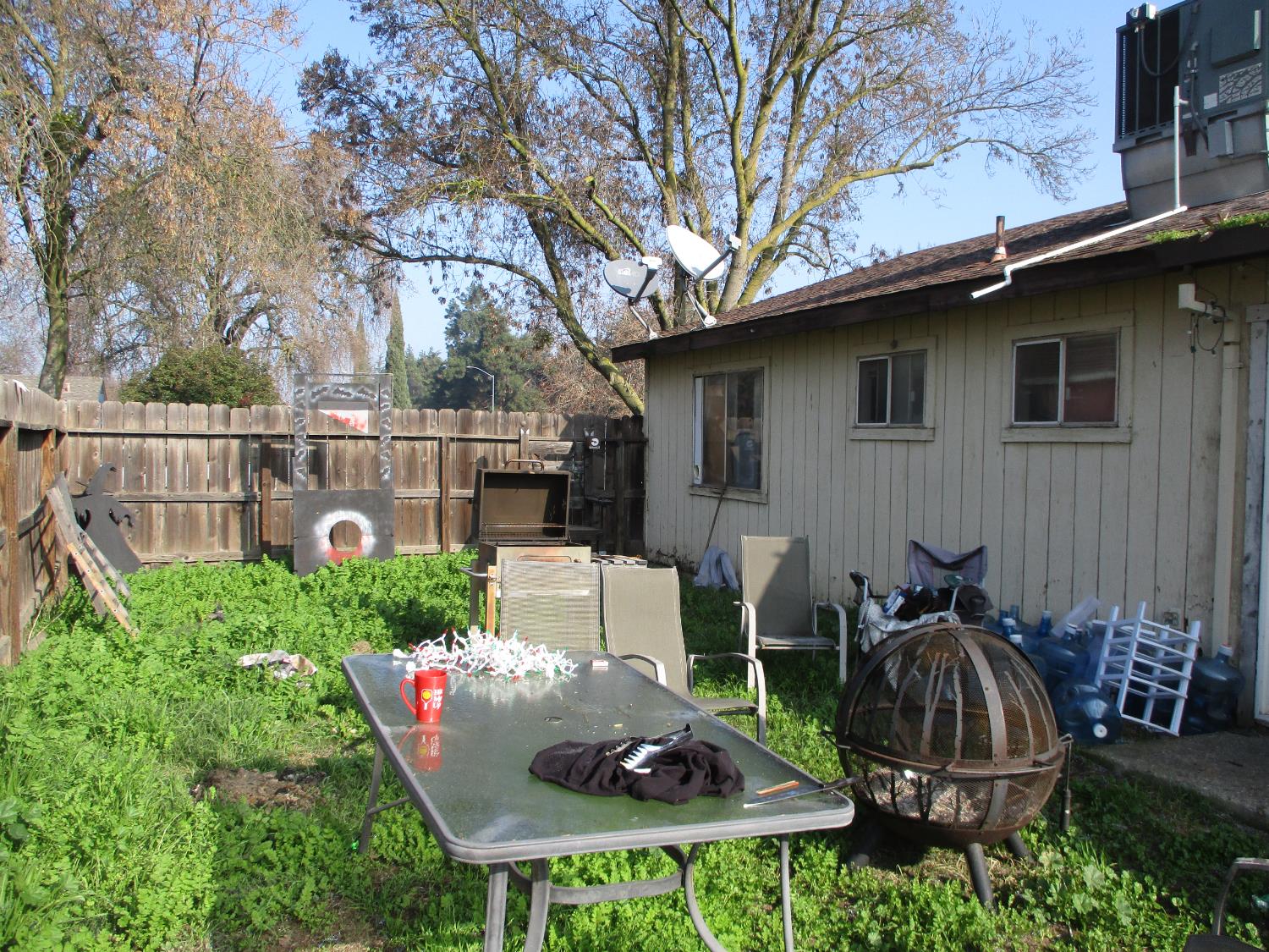 8437 Cherbourg Way Stockton, CA 95210 - Photo 26 of 28 a backyard of a house with table and chairs