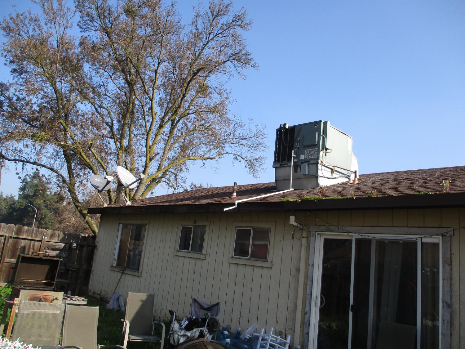 8437 Cherbourg Way Stockton, CA 95210 - Photo 27 of 28 a view of a house with large windows