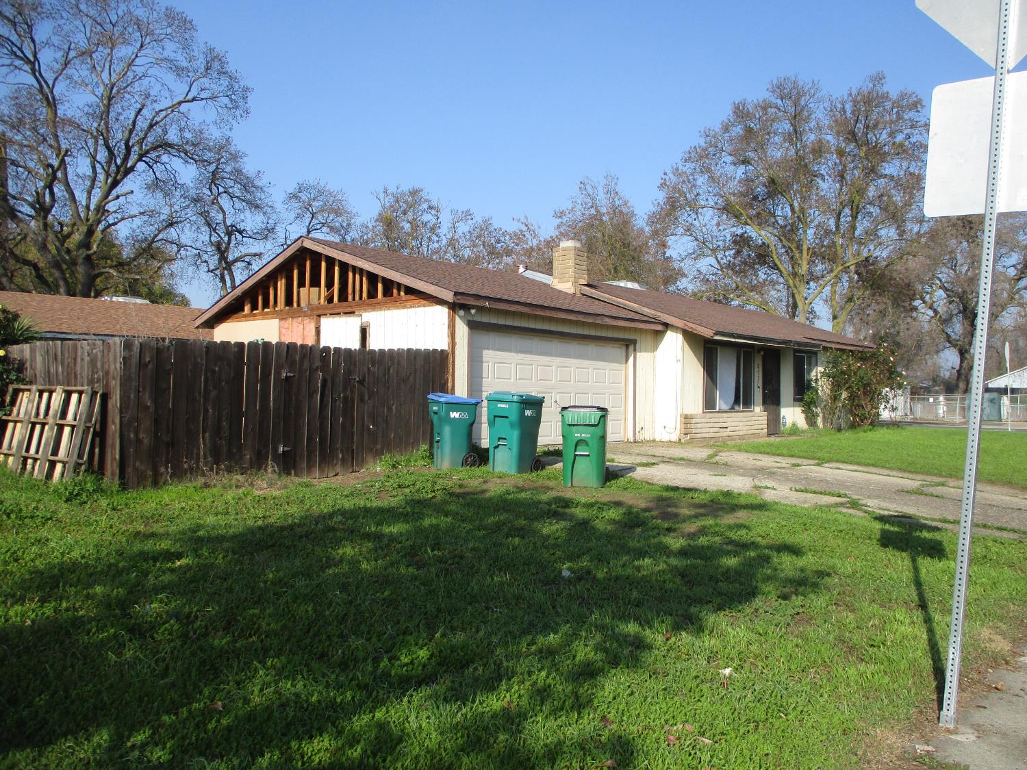 8437 Cherbourg Way Stockton, CA 95210 - Photo 28 of 28 a front view of a house with a yard