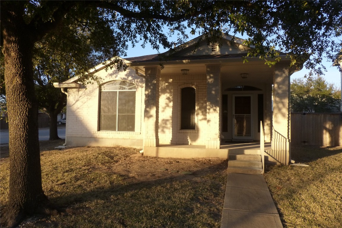 1016 Stacia's Way Pflugerville, TX 78660 - Photo 1 of 34 View of front of house with brick siding and covered porch